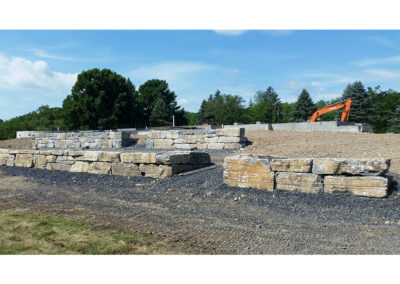 Retaining walls to mitigate 8′ of fill with tight site restrictions.