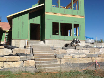New home being built in Greene County, NY with stone steps and retaining wall